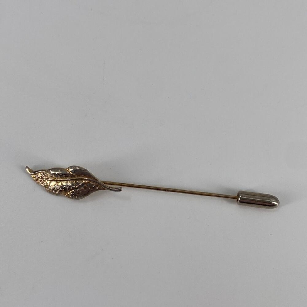 Vintage gold tone lapel pin
